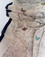 Lightweight cream voile hijab with black border for modest wear